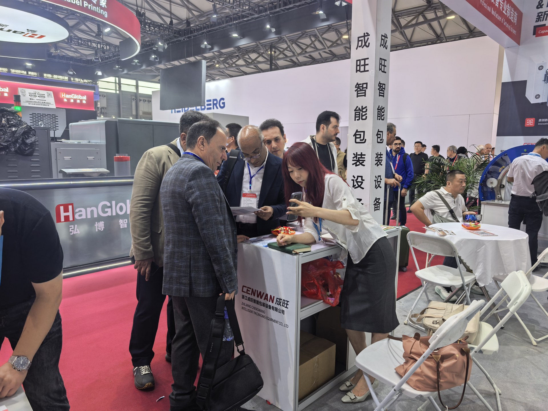 Visitors talking with Cenwan staff at the ALL IN PRINT CHINA 2026 booth